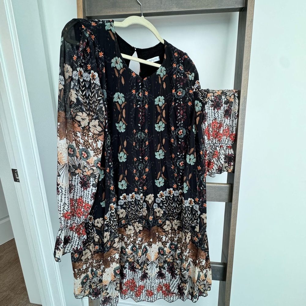 Pretty pleated dress purchased from
a boutique in Chantilly France.
